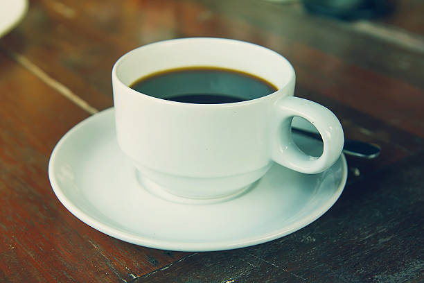 istock Coffee in a white cup on the table. 509007211