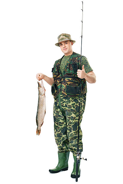 istock happy fisherman showing large fish 509008571