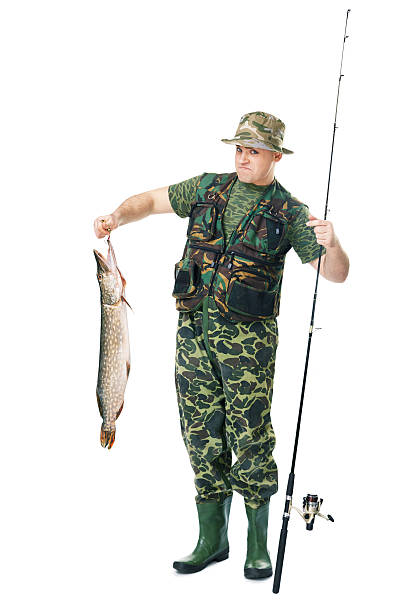istock happy fisherman showing large fish 509008573