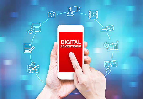 istock Hand holding smart phone with Digital Advertising word and icon 509018996