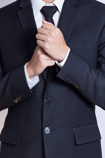 istock Businessman Fixing Cufflinks his Suit 509022934