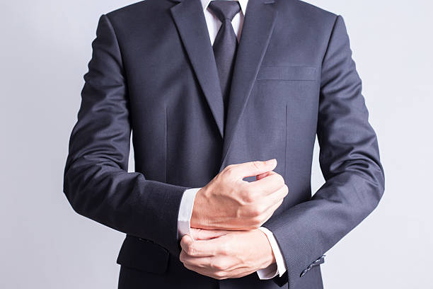 istock Businessman Fixing Cufflinks his Suit 509026604