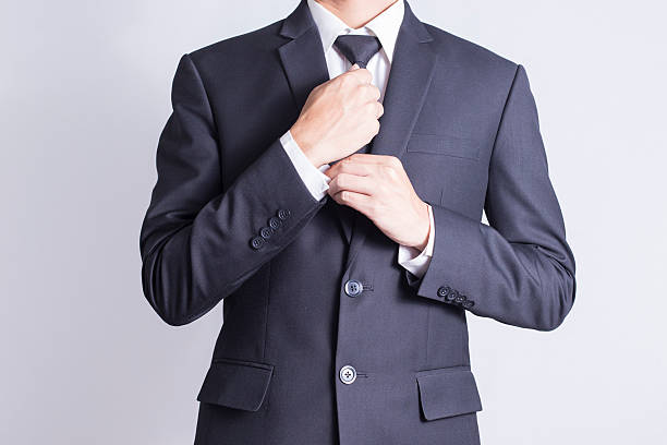 istock Businessman Adjust Necktie his Suit 509026926