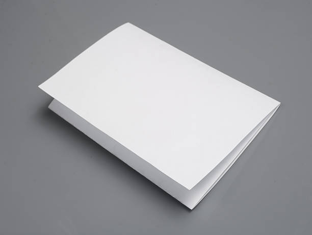 istock blank white paper with shadows, isolated on gray background 509027772