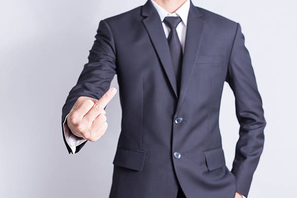 istock Businessman Show Middle Finger 509028228