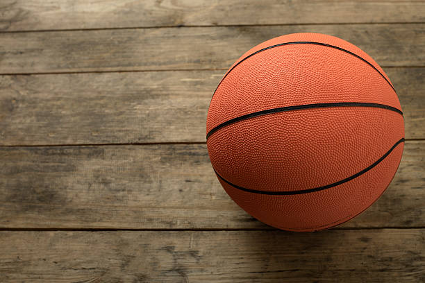 istock Basketball on old wood table 509028580