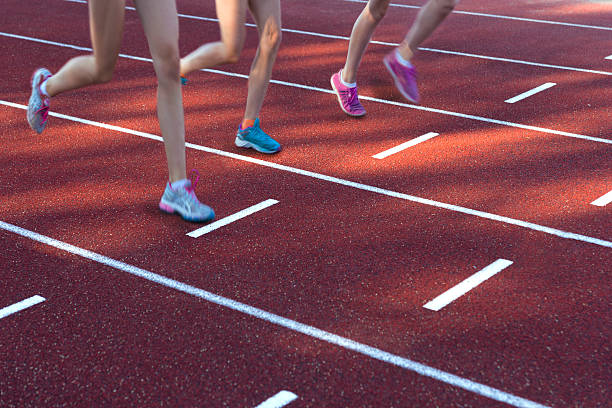 istock young girls exercising on running track 509029059