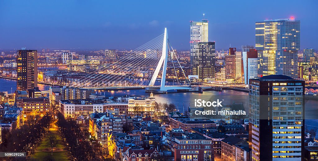 Rotterdam Skyline Aerial shot of Rotterdam skyline with Erasmus bridge at twilight as seen from the Euromast tower, The Netherlands Rotterdam Stock Photo