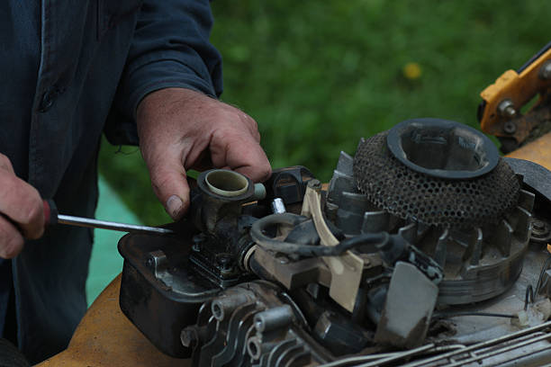 istock repairing lawn mower engine 509029622
