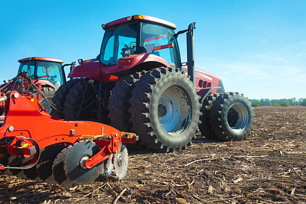 istock Red tractor in the field 509032960