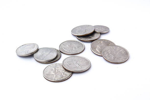 istock US coins on isolated white background 509034003