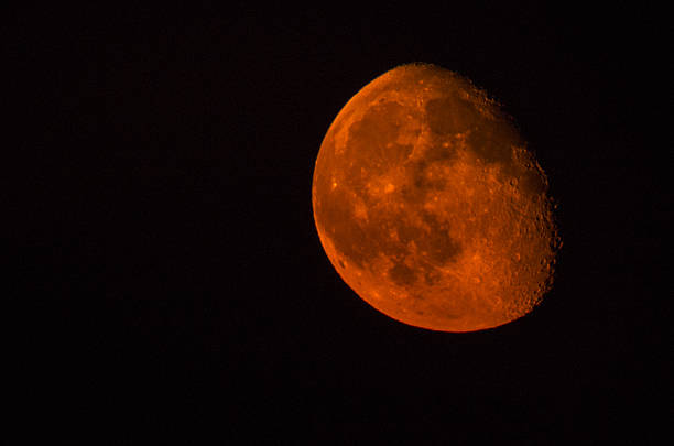 red orange moon eclipse copy space supermoon super Red and Orange moon lunar eclipse stock pictures, royalty-free photos & images