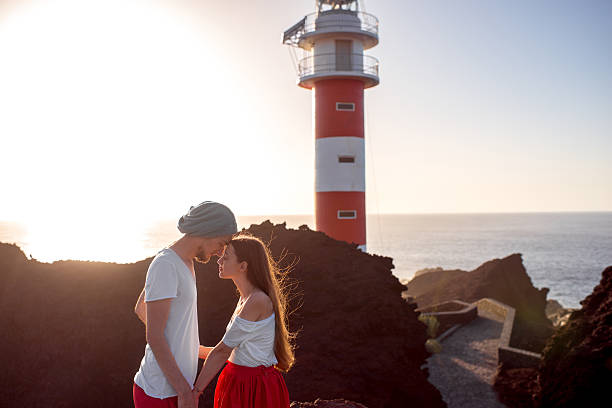 istock Couple standing together near the lighthouse 509035012