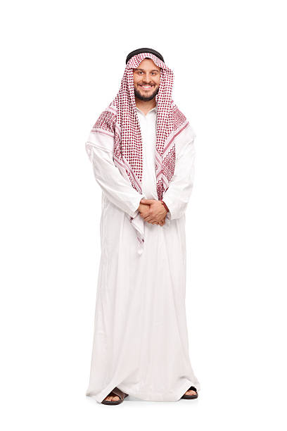 istock Young Arab in a white robe and a red veil 509041836