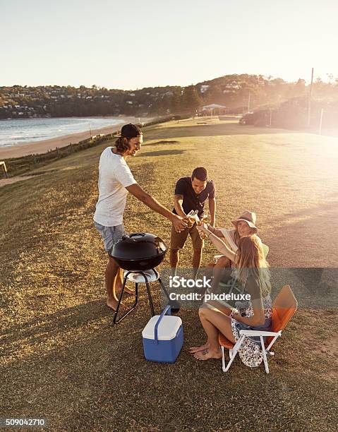 Heres To Friendship Stock Photo - Download Image Now - Barbecue Grill, Beach, Picnic