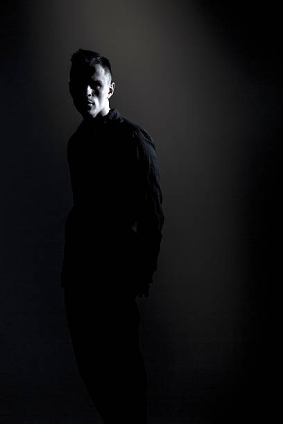 istock Man Out Of Darkness 509045122