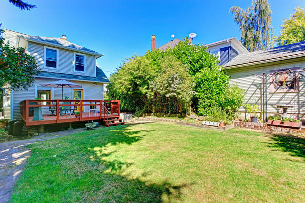 istock House with backyard walkout deck and patio area 509046389