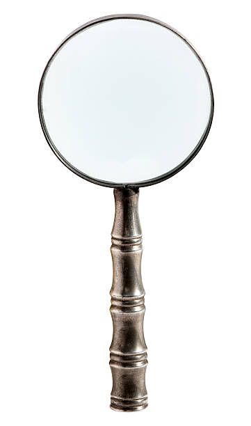 istock Round metal magnifying glass isolated on white 509046760