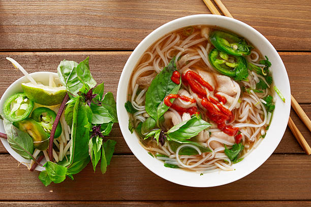 beef pho tai with sriracha sauce aerial view