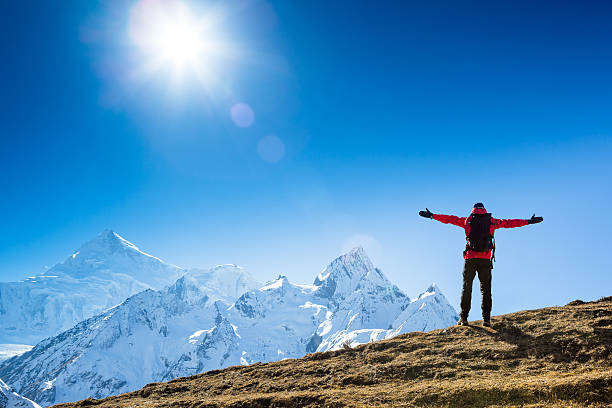 istock Hiker with backpack standing on top of a mountain 509047031