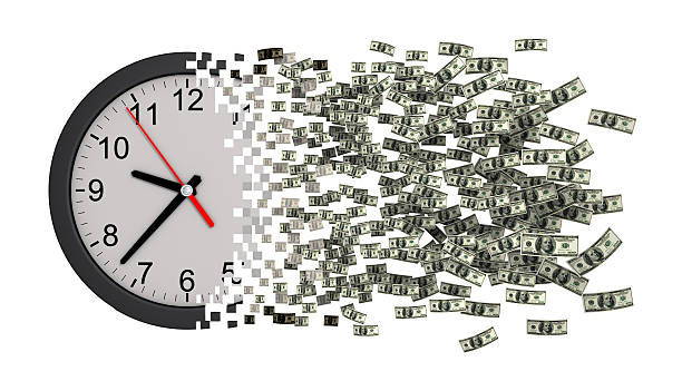 istock Time Is Money. Clock Falling Apart To Dollars. 509048796