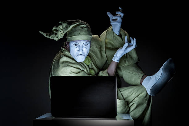 mime のインターネット - clown laptop bizarre men ストックフォトと画像