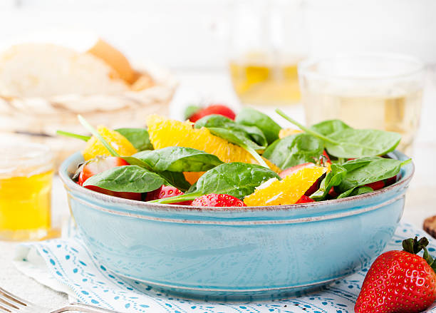 istock Fresh salad with strawberry, orange and spinach 509051078