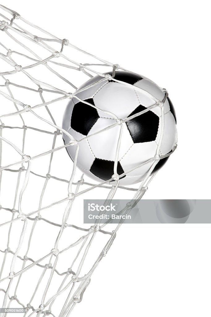 Goal Soccer ball in the goal net isolated on white background Soccer Stock Photo