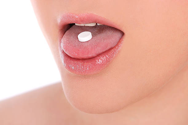 istock Woman takes pill 509052285