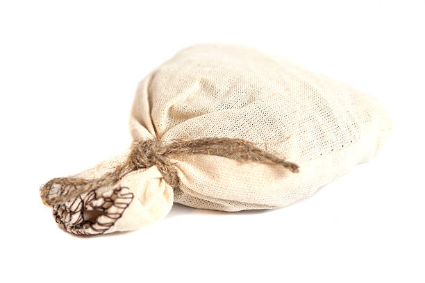 istock Tied with rope sack bag isolated on white 509052376