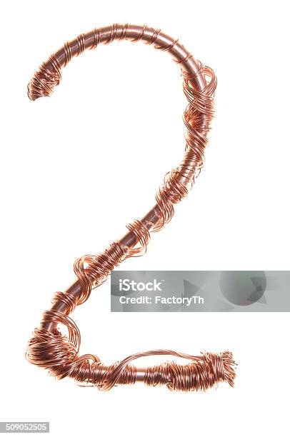 Twisted Copper Wire In The Shape Of A Number Two Stock Photo - Download Image Now - Alphabet, Brown, Cable