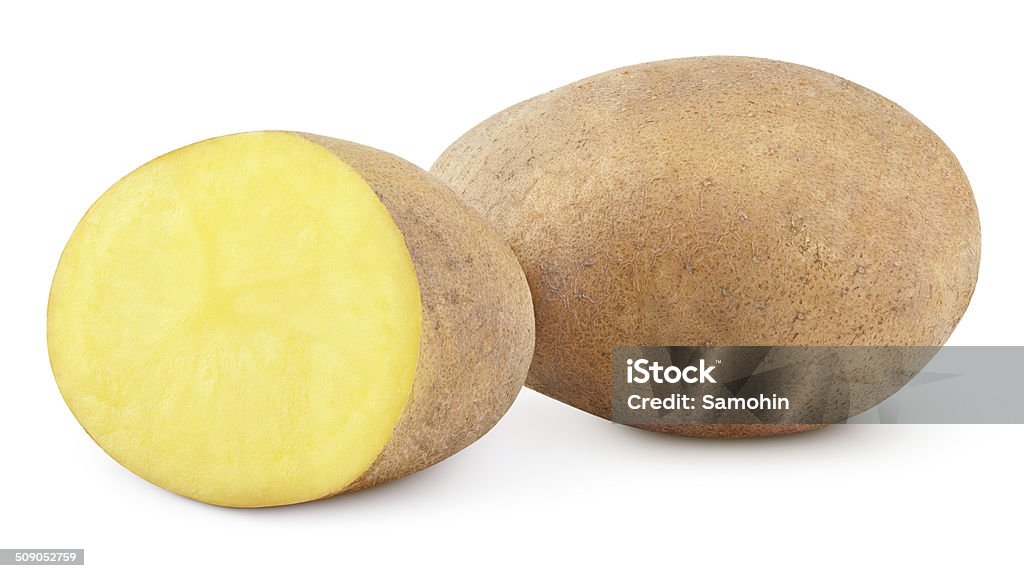 Potatoes isolated on white Closeup of potato with cut isolated on white background with clipping path Autumn Stock Photo