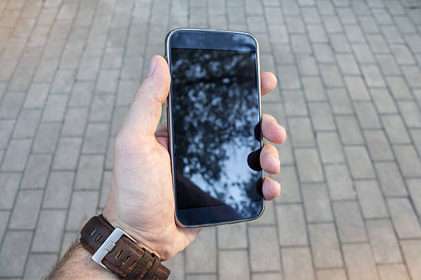 istock Closeup of hand using smartphone 509052906