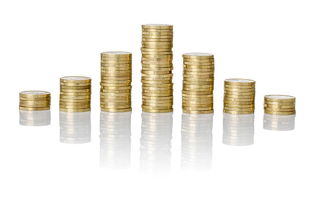istock Pyramid of coins stacks on a white background 509053084