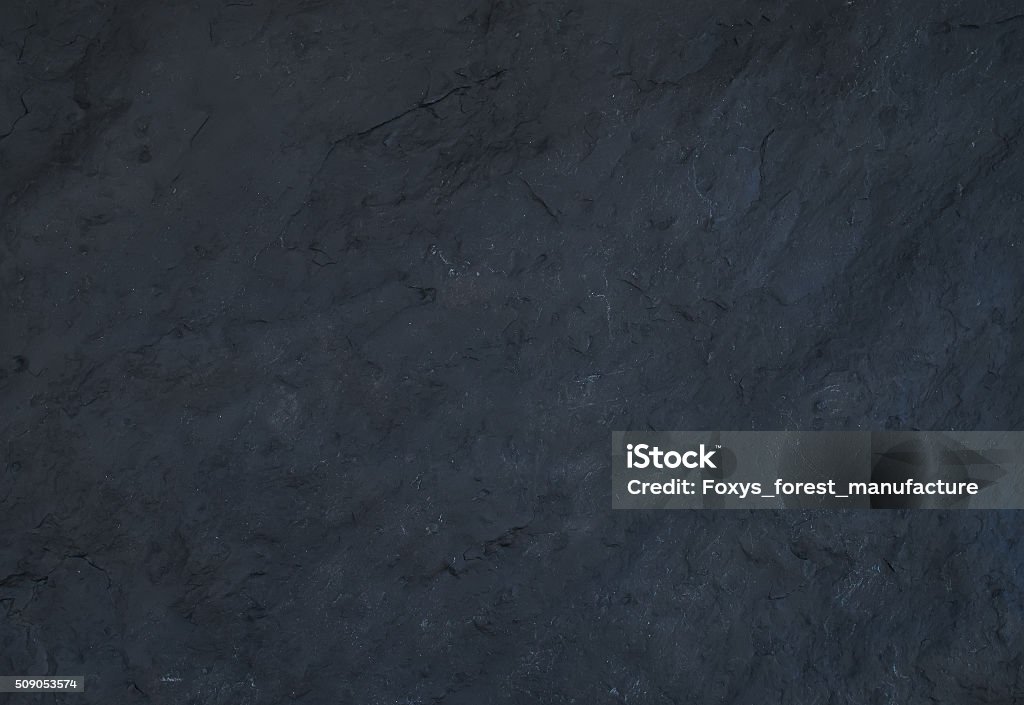 Black natural slate stone texture or background Writing Slate Stock Photo