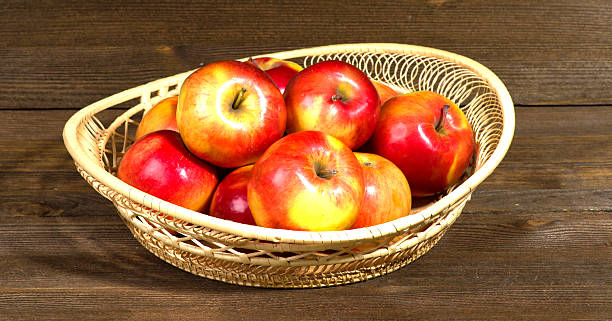 istock fresh apples on a wooden table in the background 509056424