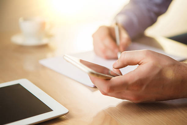 istock The male hand holding a phone 509056772