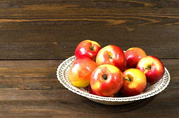 istock fresh apples on a wooden table in the background 509057126