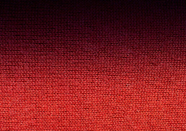 istock Red wool knitwork fade to black 509076213