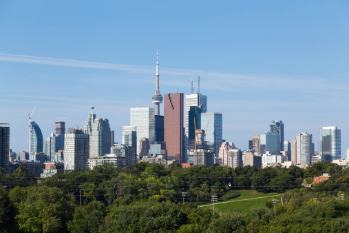 A view of Toronto from the East during the day, with logos removed from buildings