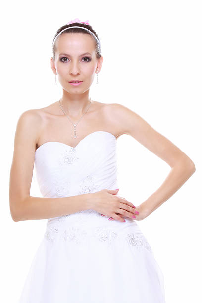 istock Wedding day. Romantic bride in white dress isolated 509082229