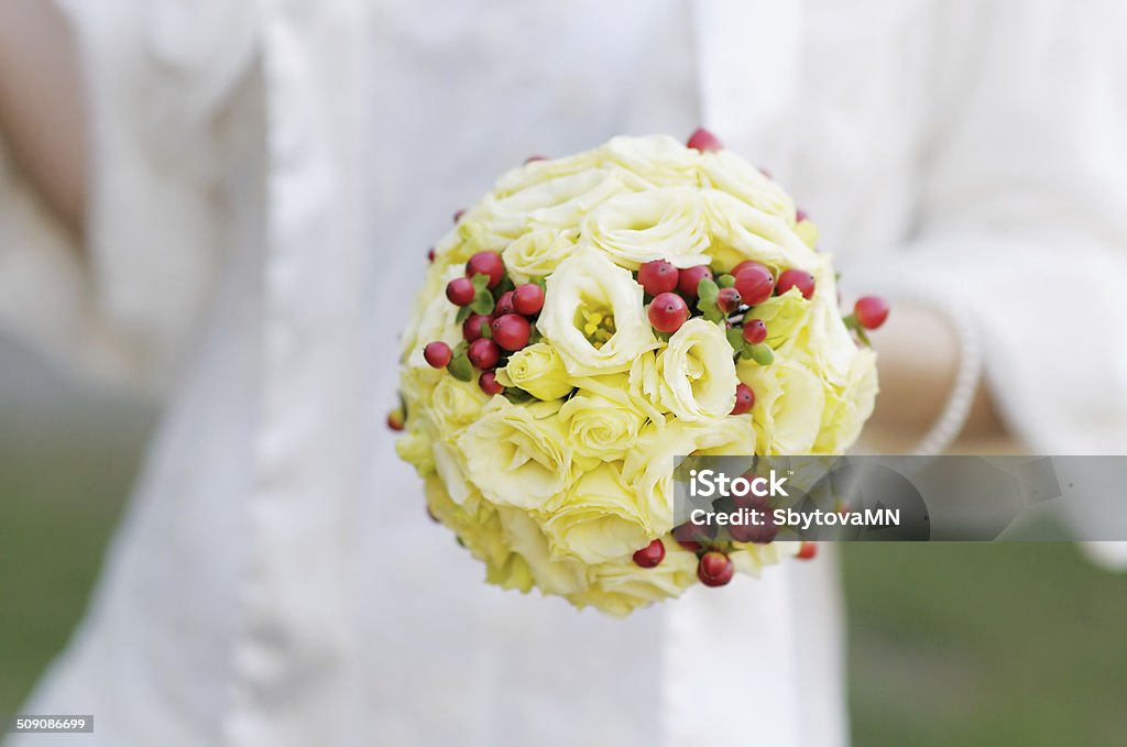 Wedding flowers bouquet Bride holding beautiful wedding flowers bouquet Adult Stock Photo