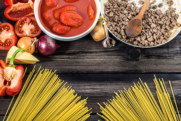 istock Ingredients of spaghetti bolognese arranged on wooden table. 509089152