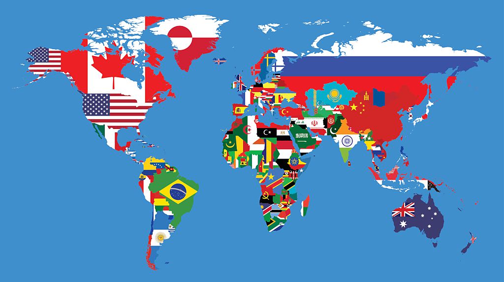 Detailed map of the whole World with all the countries flags inside their borders.