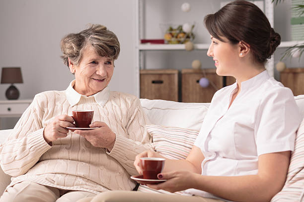 istock Senior lady with caregiver 509092850