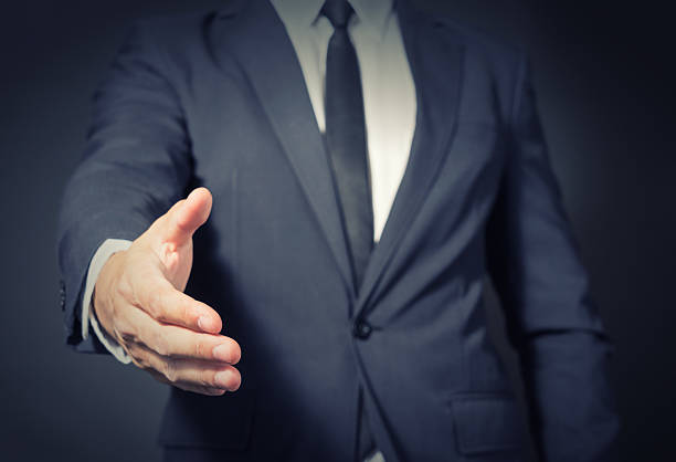 istock Businessman shaking hands .Cross process colour style 509093408