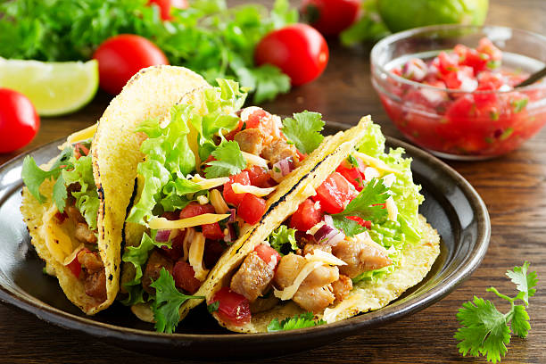 istock Tacos with pork and tomato salsa. 509094036