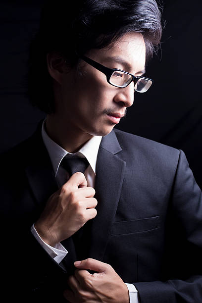 istock Businessman Adjust Necktie his Suit 509095552