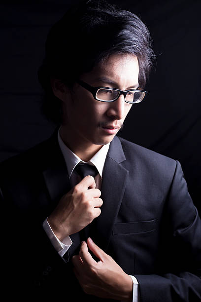 istock Businessman Adjust Necktie his Suit 509095632