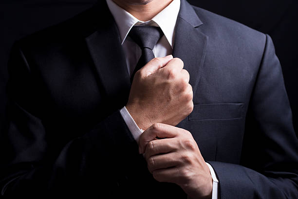 istock Businessman Fixing Cufflinks his Suit 509095988
